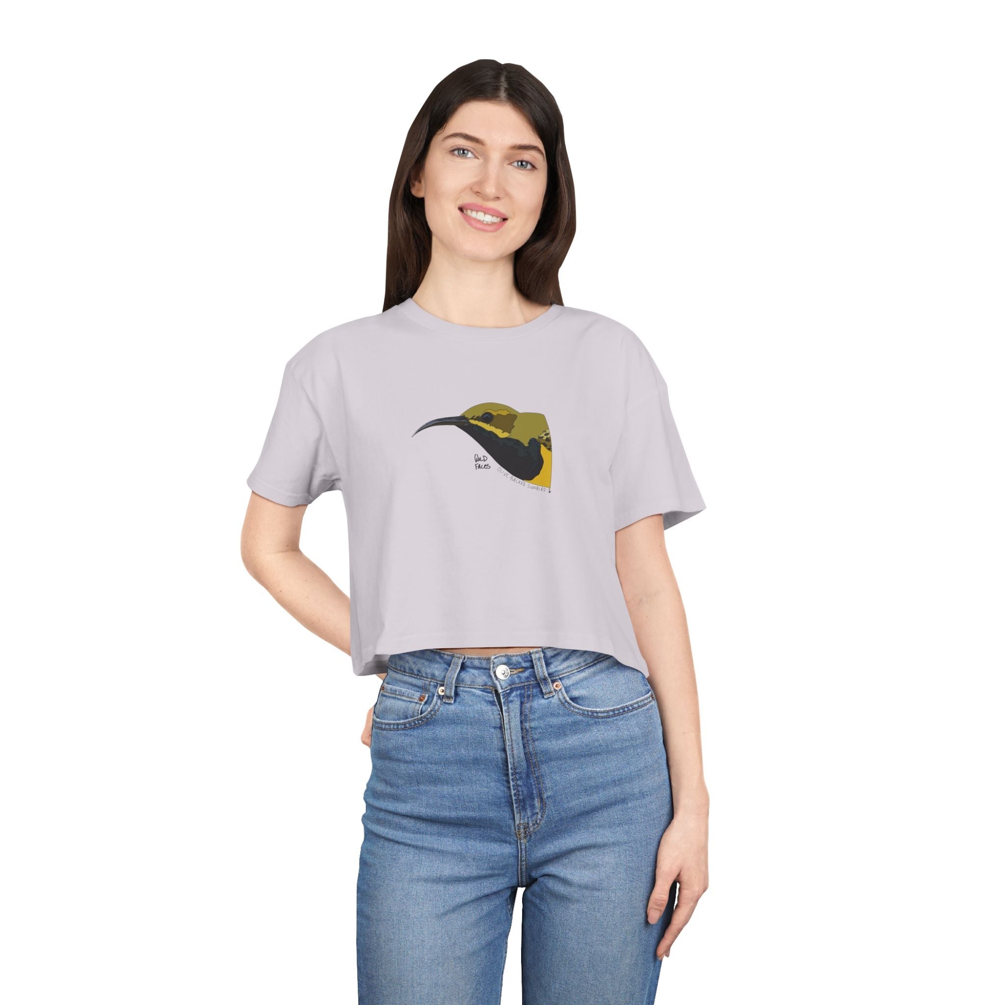 Woman in cropped tee with sunbird design